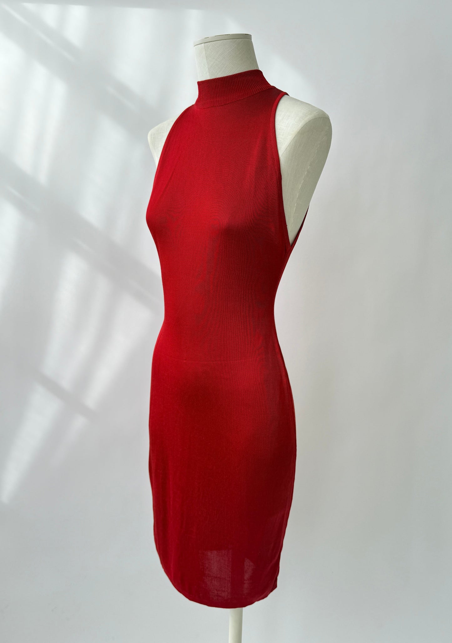 Front view of the rare and vintage 1986 Azzedine Alaia dress on a mannequin.