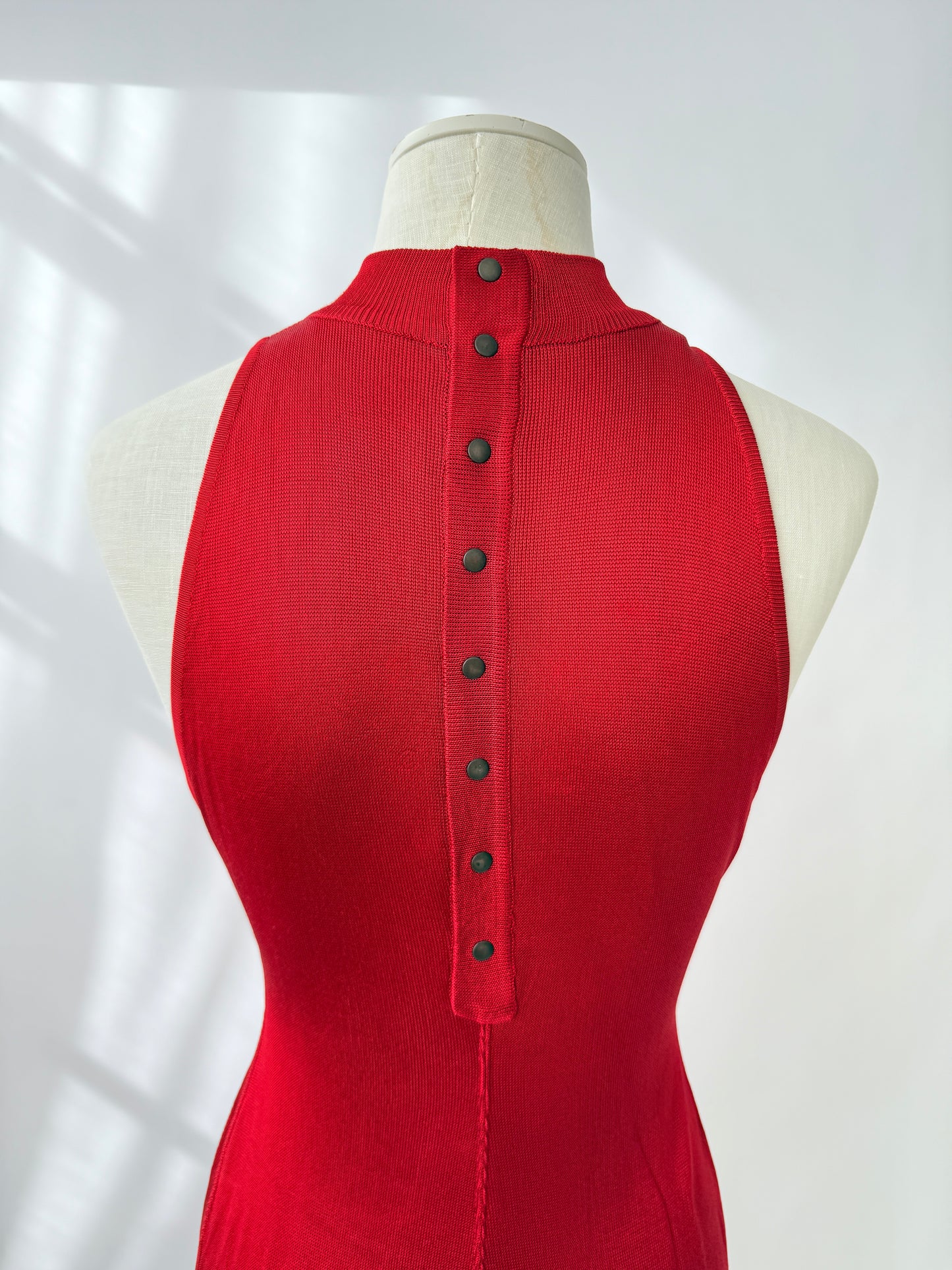 Close up of the back of the rare and vintage 1986 Azzedine Alaia dress on a mannequin.