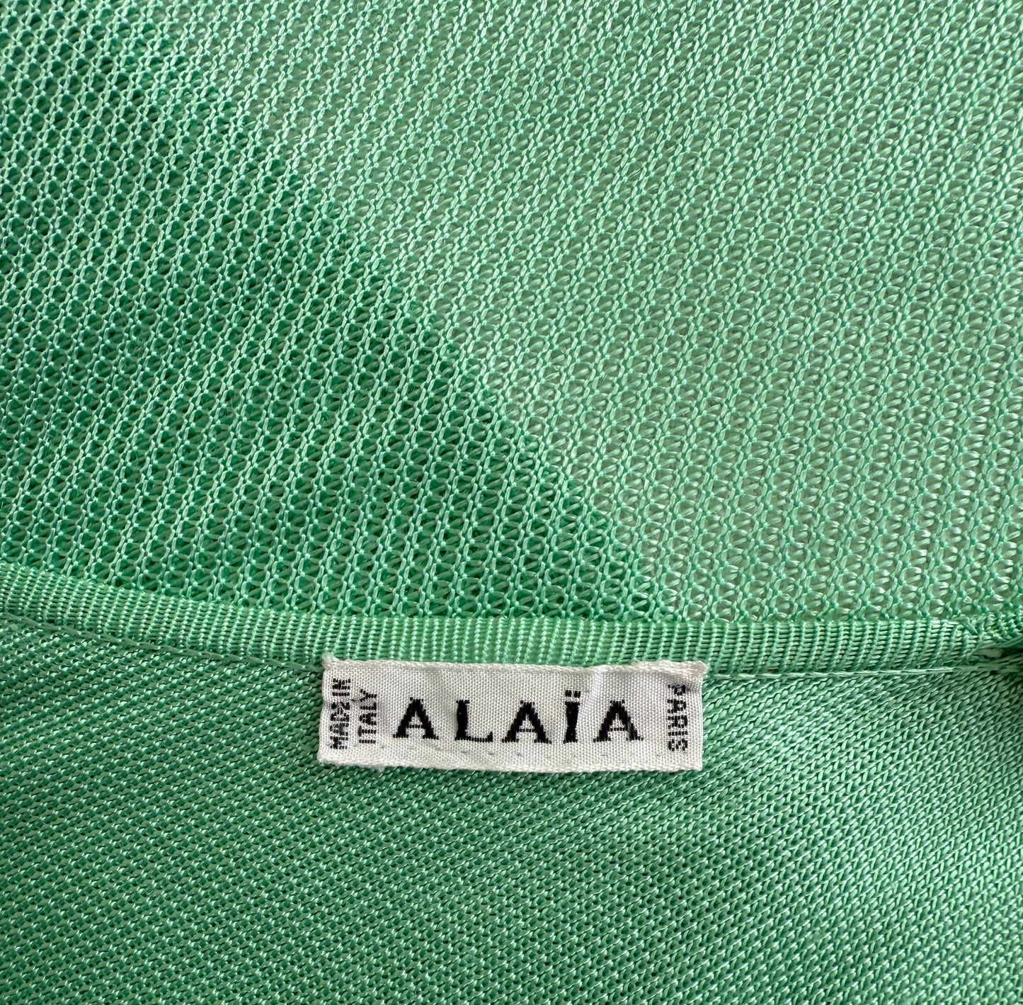A close up of the brand label of the dress.