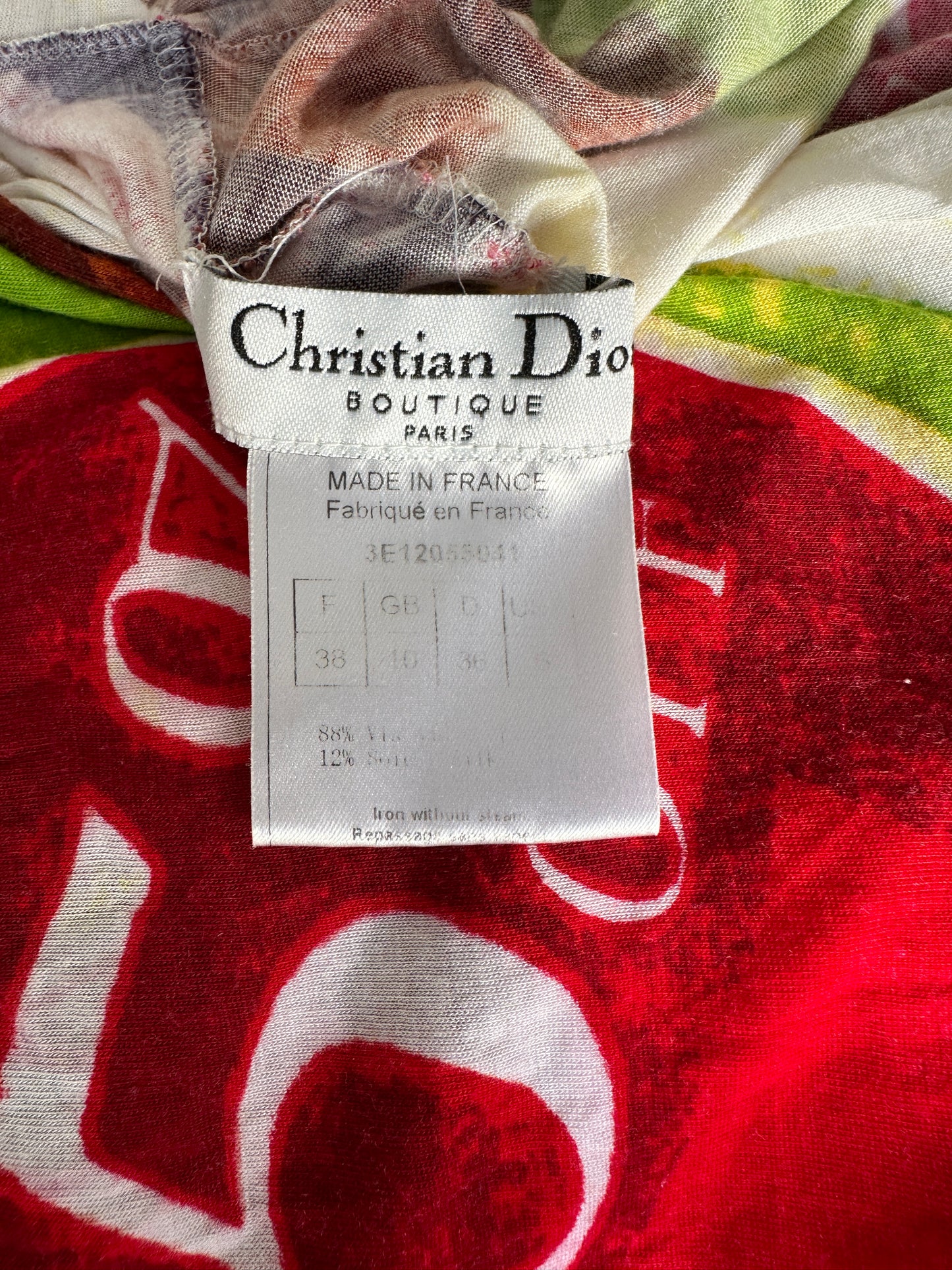 Close-up of the brand label of the Christian Dior by John Galliano S/S 2003 "Victim" Draped Top.