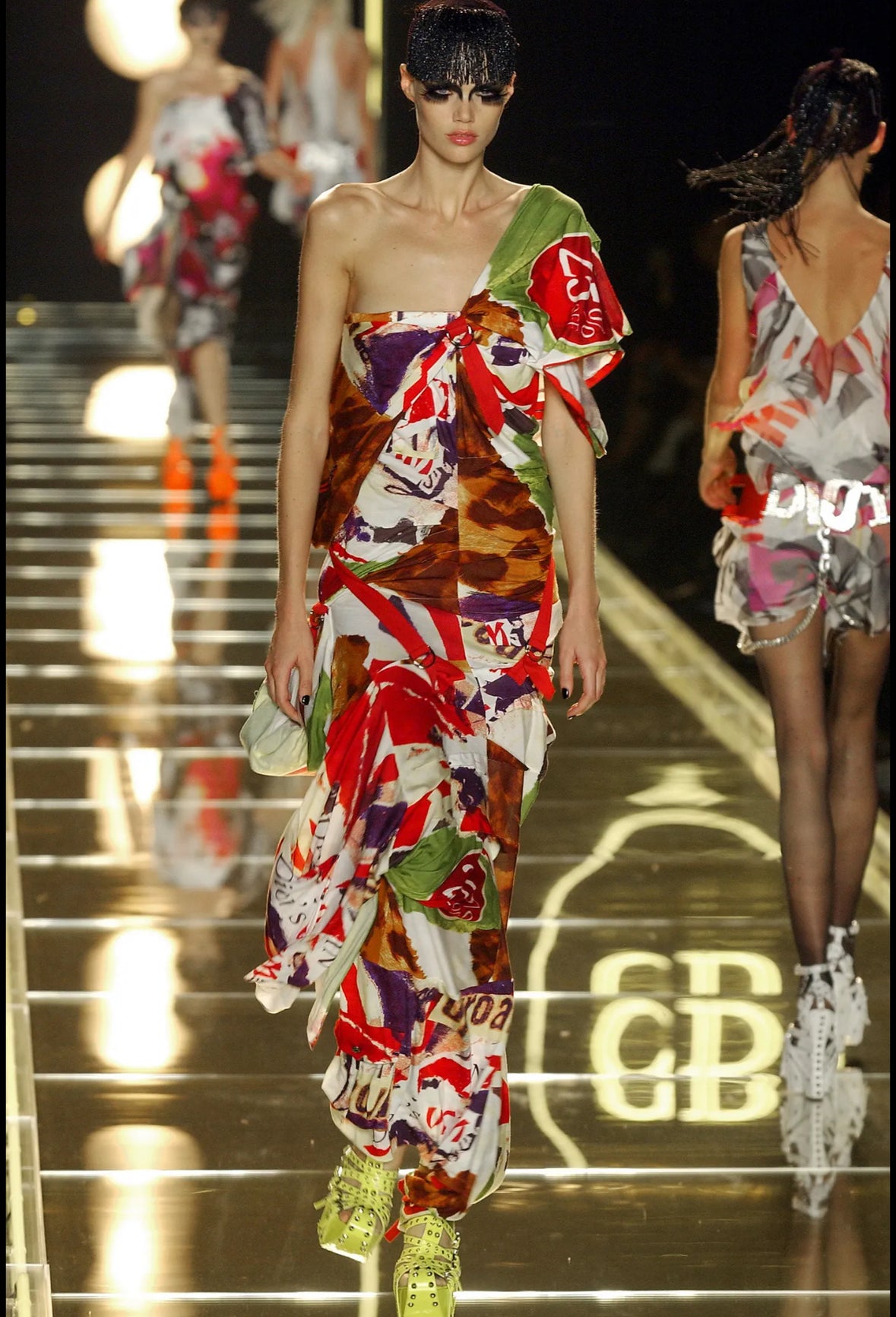 Christian Dior by John Galliano S/S 2003 "Victim" Draped Top on the runway on a different model.