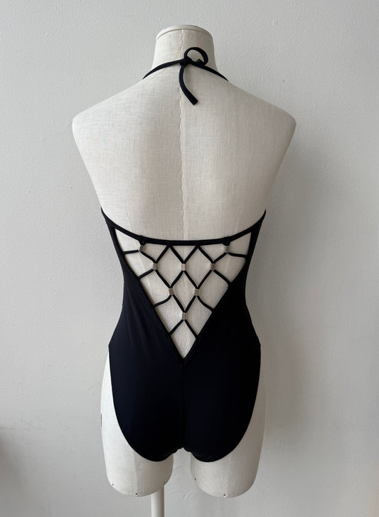 Back view of the Paco Rabanne Vintage 90s/00s Bathing Suit showcasing a geometric open back shown on a mannequin