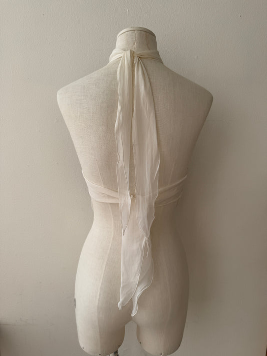 Back view of the Emanuel Ungaro Silk Halter Top showcasing the open back on a mannequin