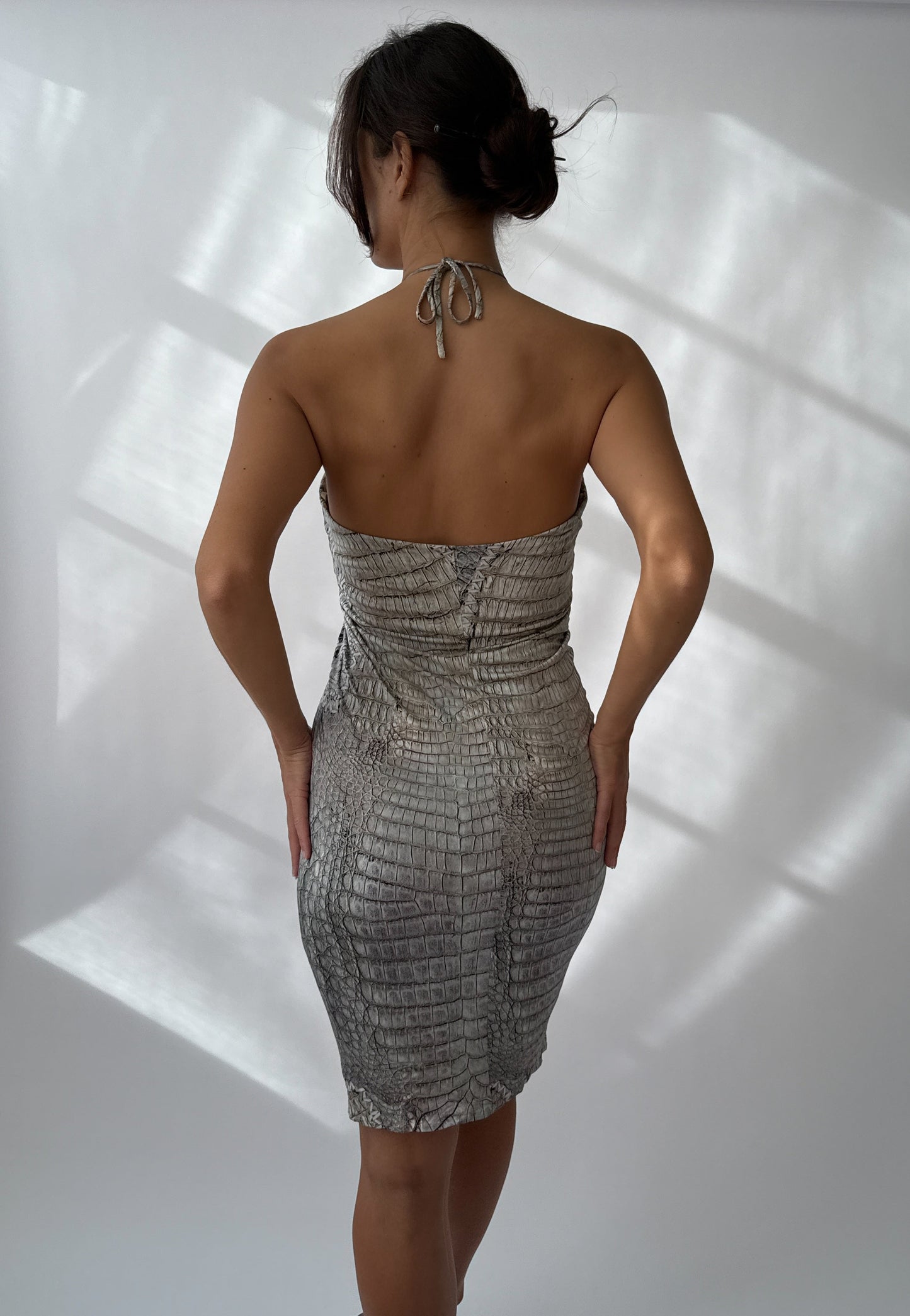 Roberto Cavalli S/S 2011 Crocodile Print shown on a live model from the back.