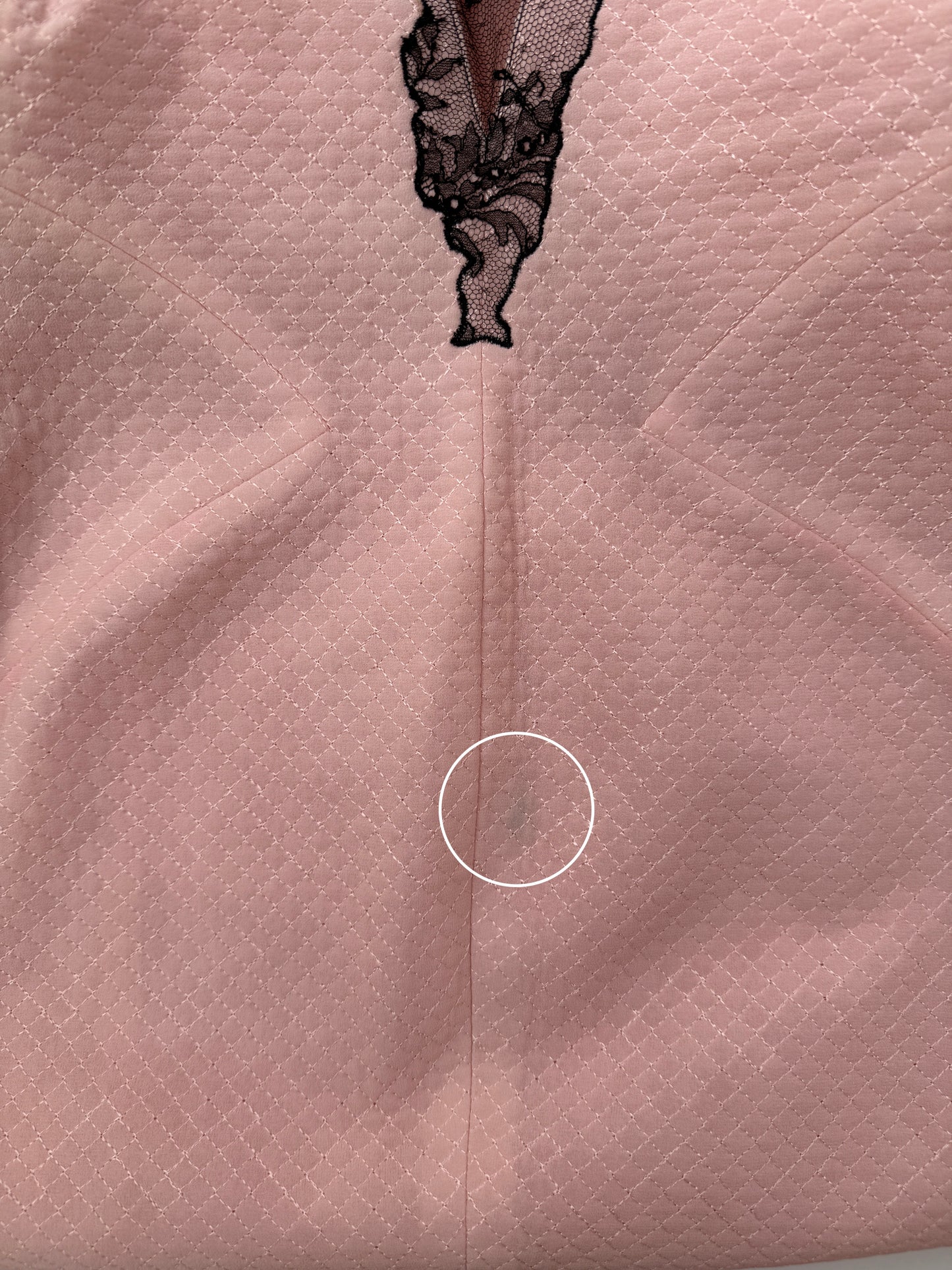 Close-up of the Versace dress showing the fabric.