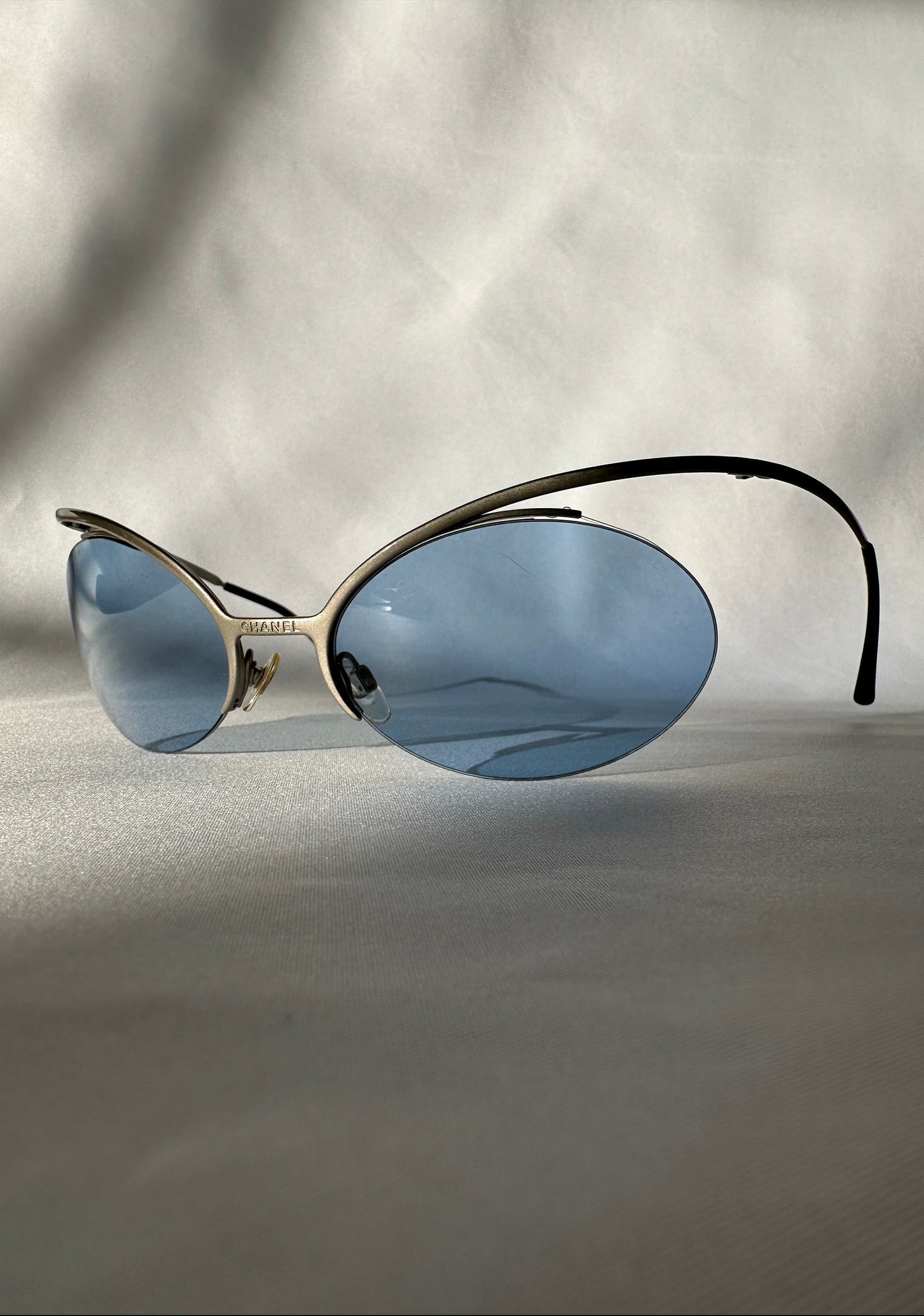 Chanel by Karl Lagerfeld S/S 2000 Futuristic Rimless Blue Sunglasses.