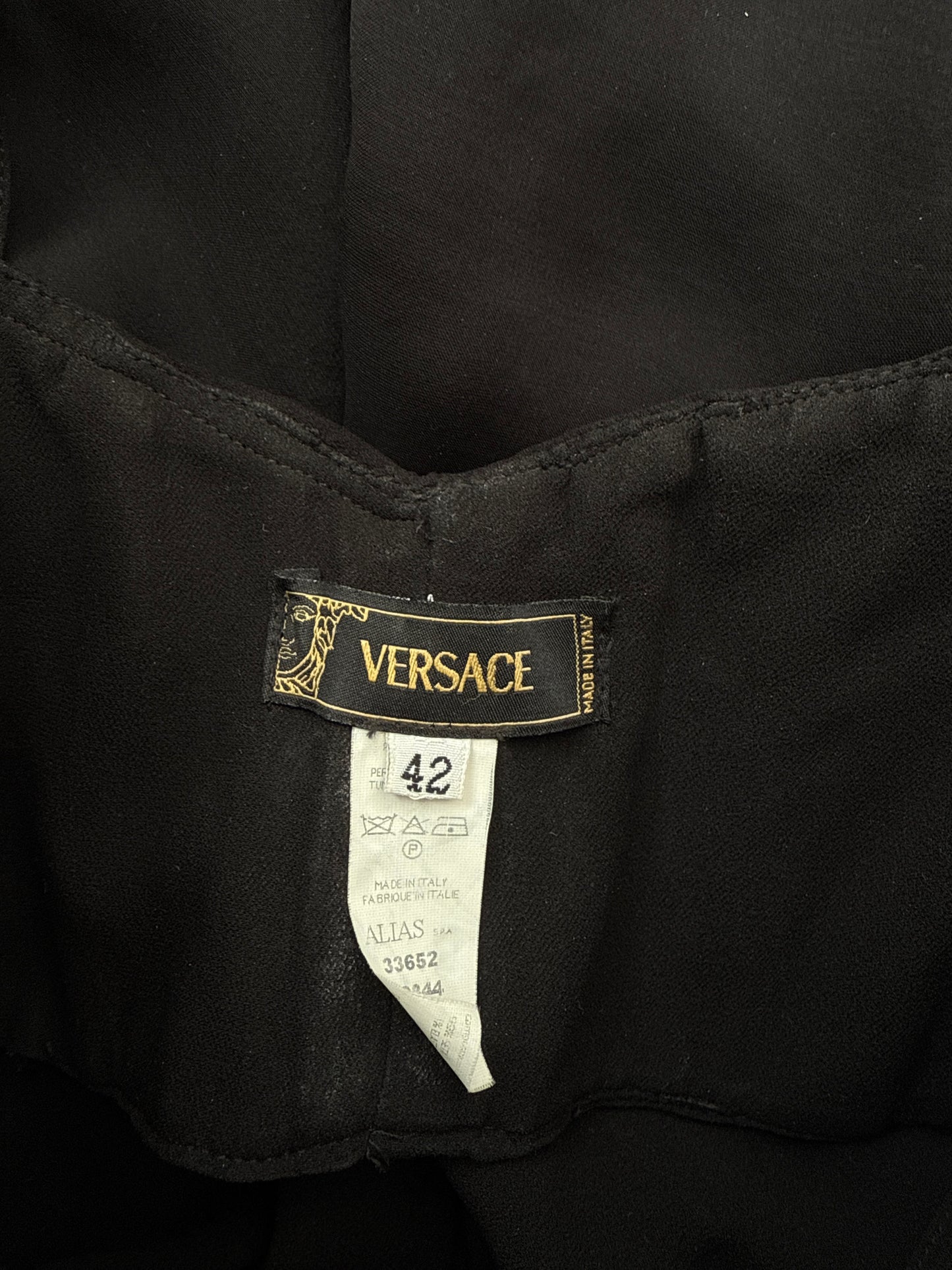 Interior brand label from the Versace Spring/Summer 2004 vintage silk ruffled dress.