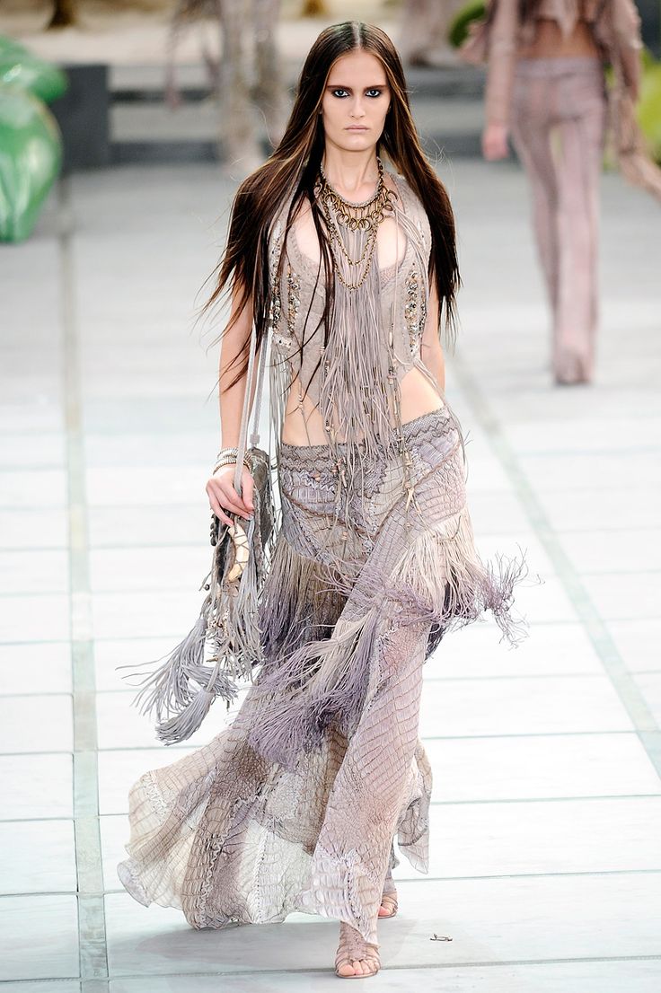 Roberto Cavalli S/S 2011 dress with Gold Detail shown on the runway in a different design.