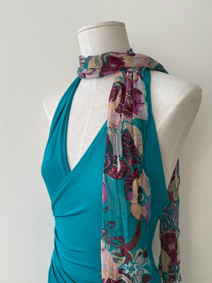 Detailed side front photo of the neckline of the Emanuel Ungaro Teal dress with a scarf