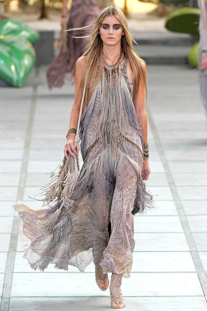 Roberto Cavalli S/S 2011 dress with Gold Detail shown on a model on the runway.
