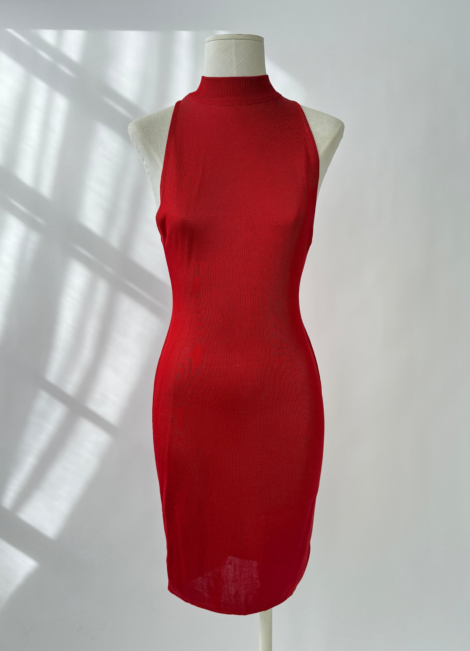 Front side view of the rare and vintage 1986 Azzedine Alaia dress on a mannequin.