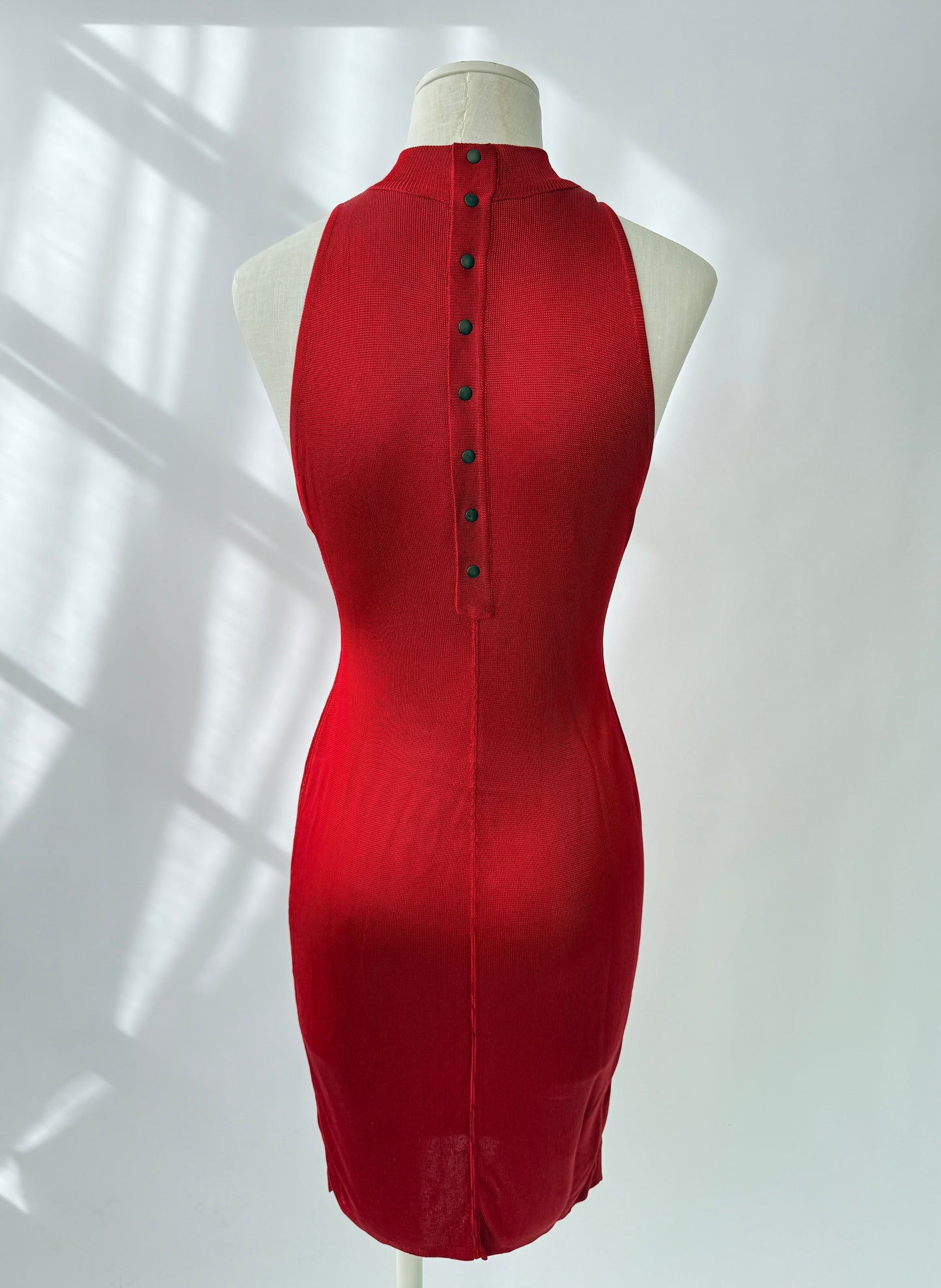 Back view of the rare and vintage 1986 Azzedine Alaia dress on a mannequin.