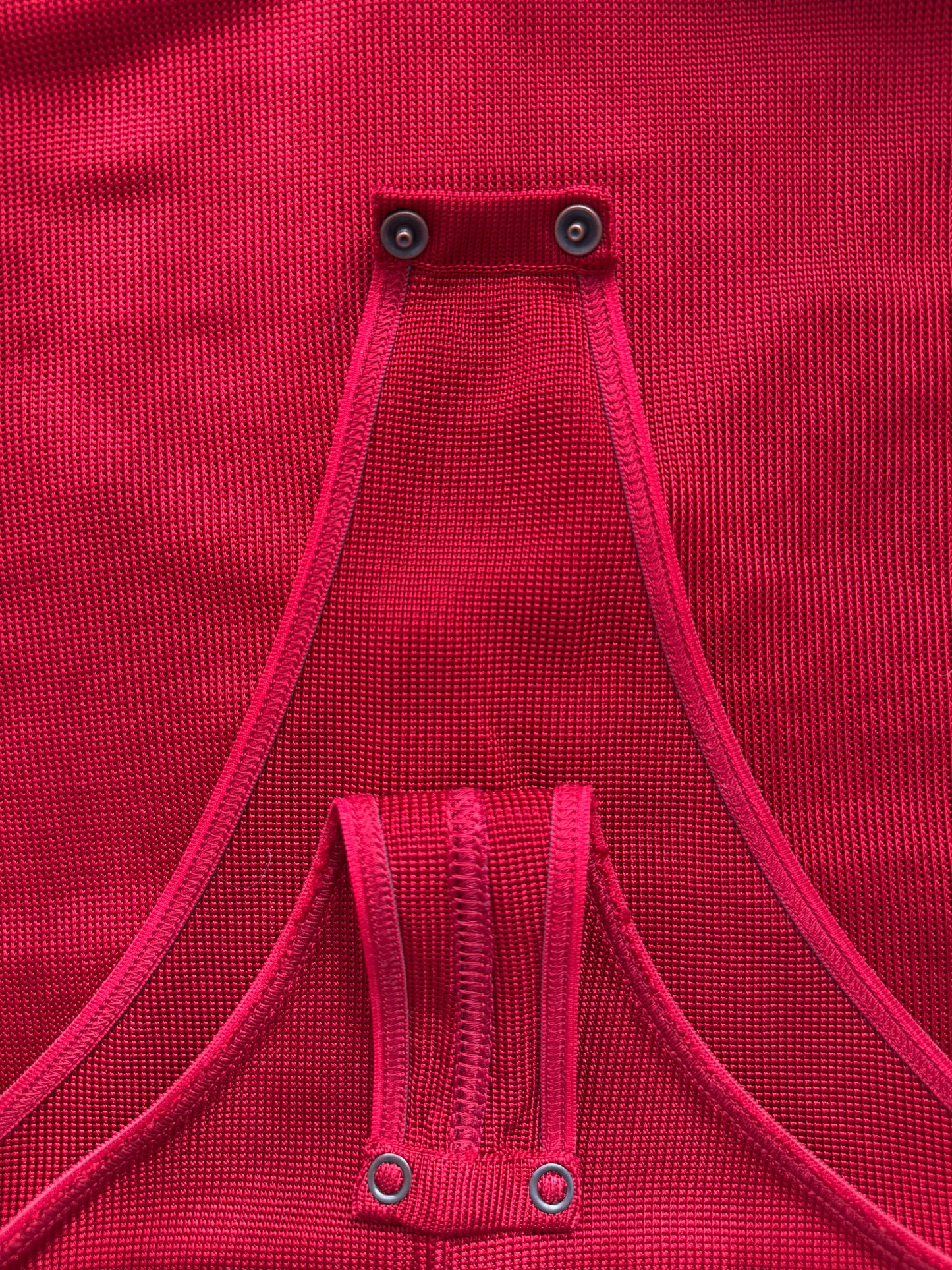 Azzedine Alaia 1986 lace-up detail from vintage red skirt and bodysuit set in size XS.