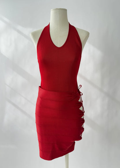 Azzedine Alaia 1986 red lace-up skirt, top and body set on a mannequin, size XS, showcasing bondage style design.