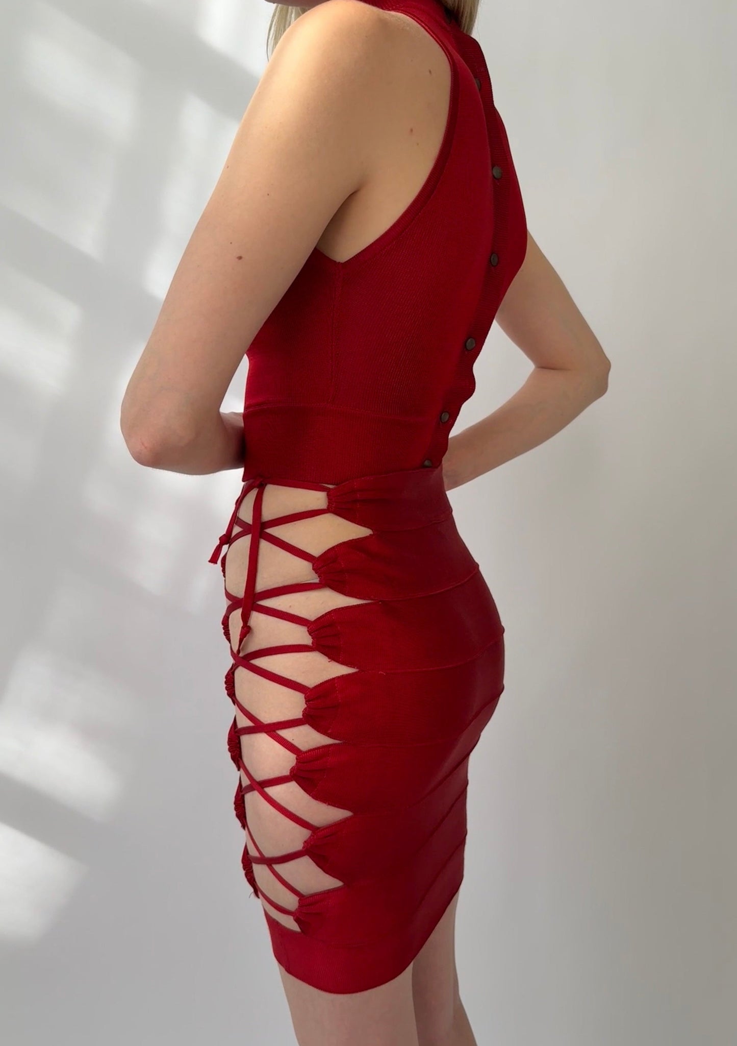 Azzedine Alaia 1986 Lace-up Skirt, Top & Body Set in red, showcasing lace-up details and modern bondage style.