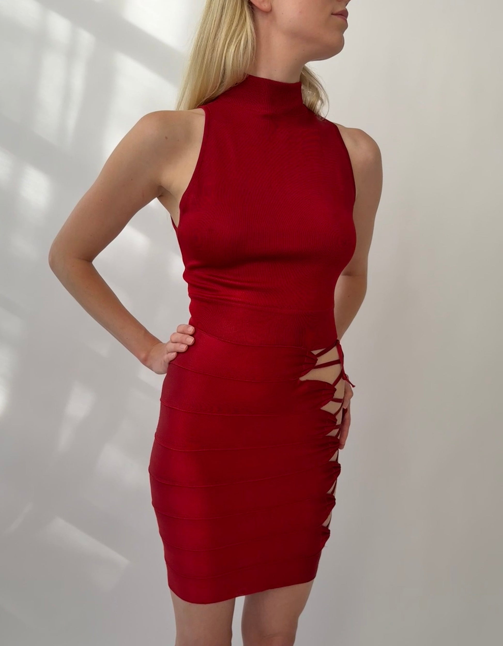 Azzedine Alaia 1986 Lace-up Skirt, Top & Body Set in red, showcasing a sleek sleeveless design and adjustable lace-up detail.