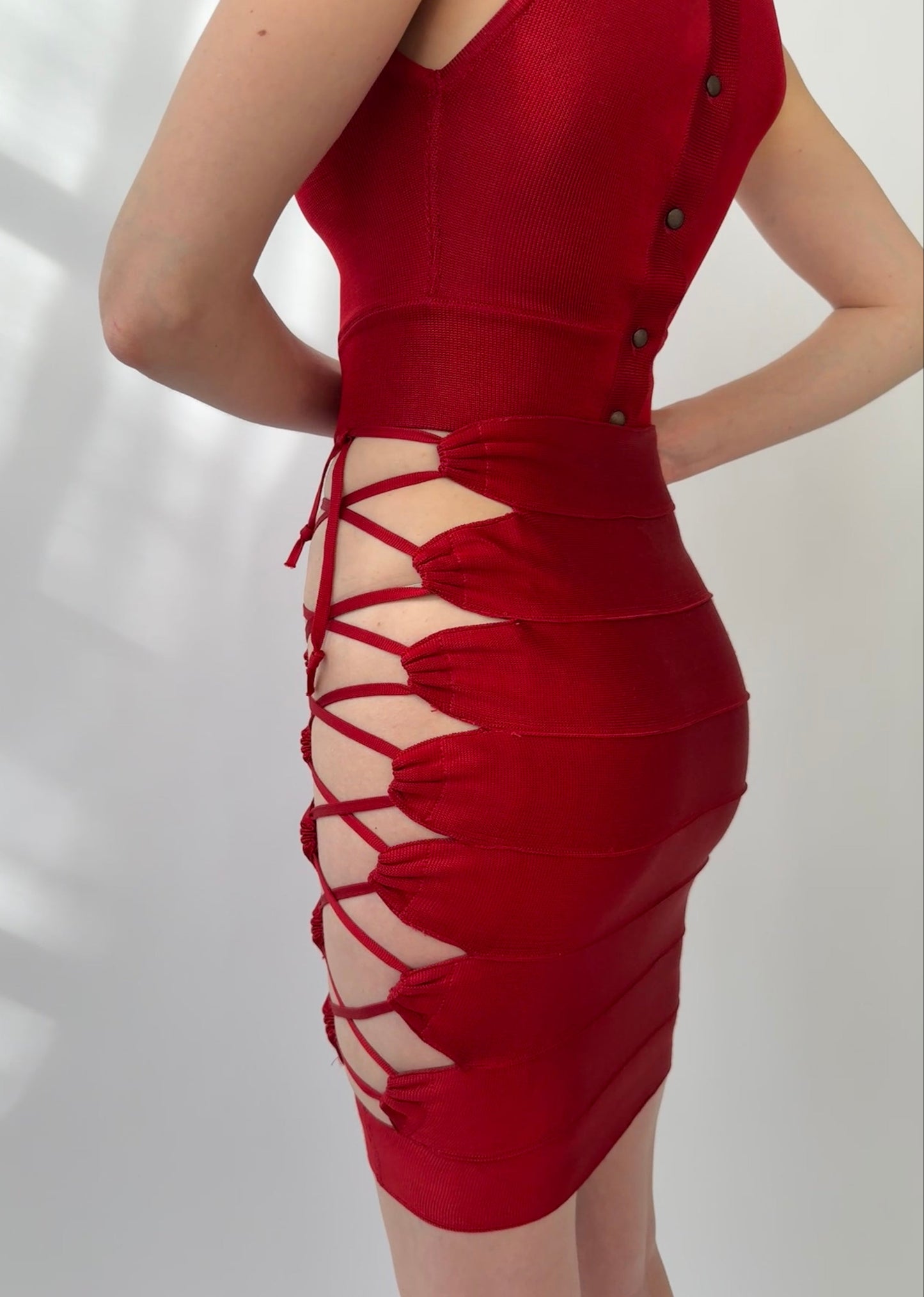 Azzedine Alaia 1986 Lace-up Skirt featuring adjustable lace-up detail and elegant design in vintage red color.