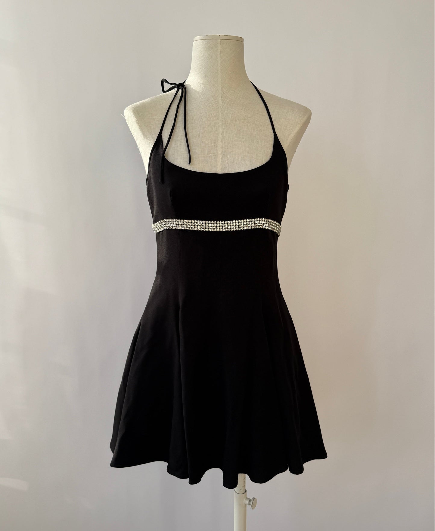 The Dolce & Gabbana 1995 rhinestone dress viewed from the front and shown on a mannequin.