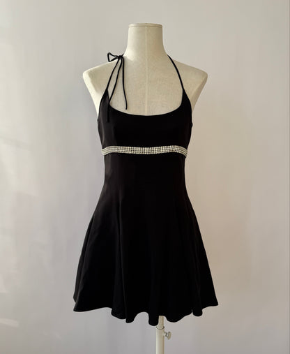 The Dolce & Gabbana 1995 rhinestone dress viewed from the front and shown on a mannequin.