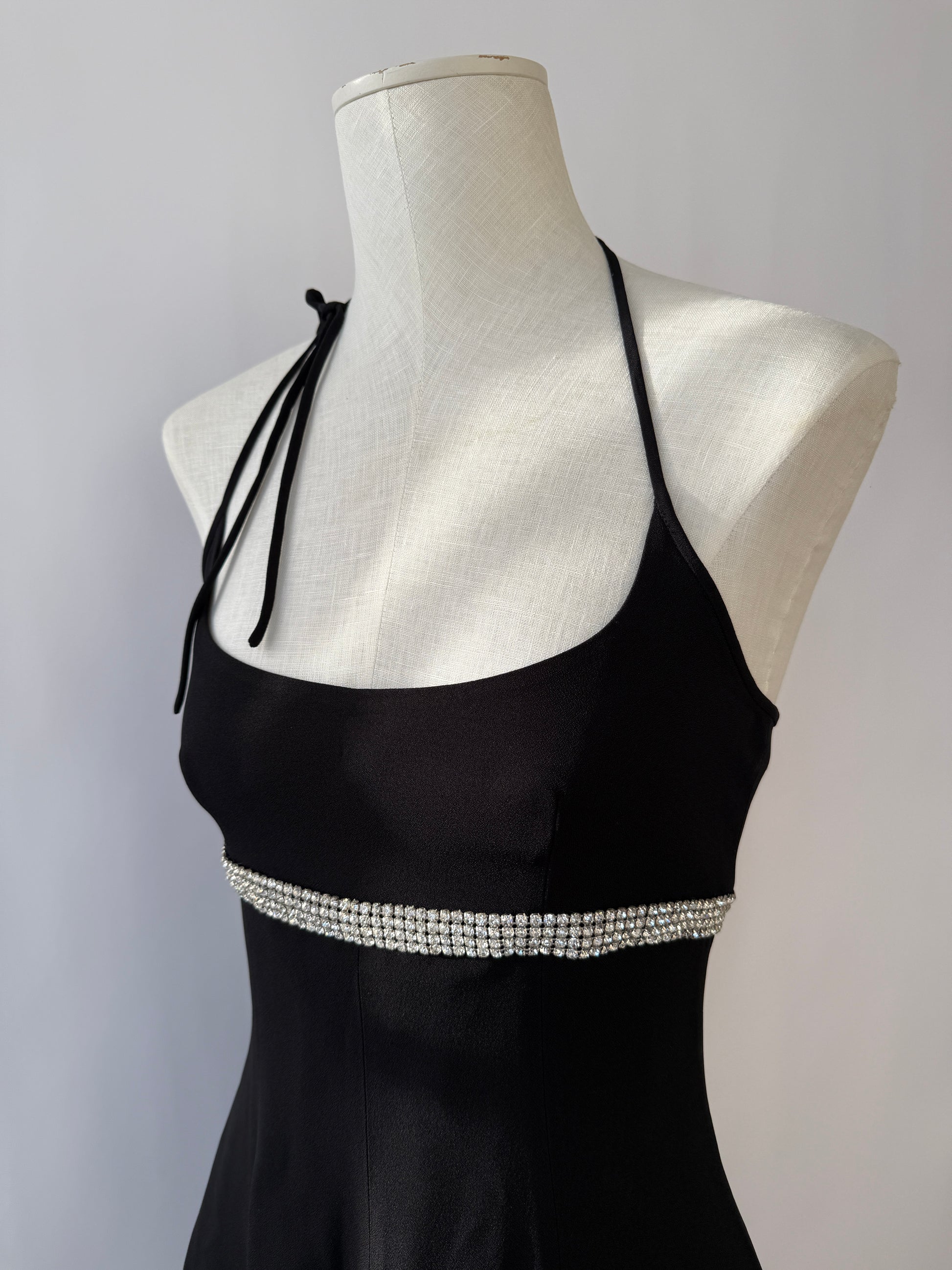 Zoomed-in image of the Dolce & Gabbana 1995 dress with rhinestones, showcasing the neckline.