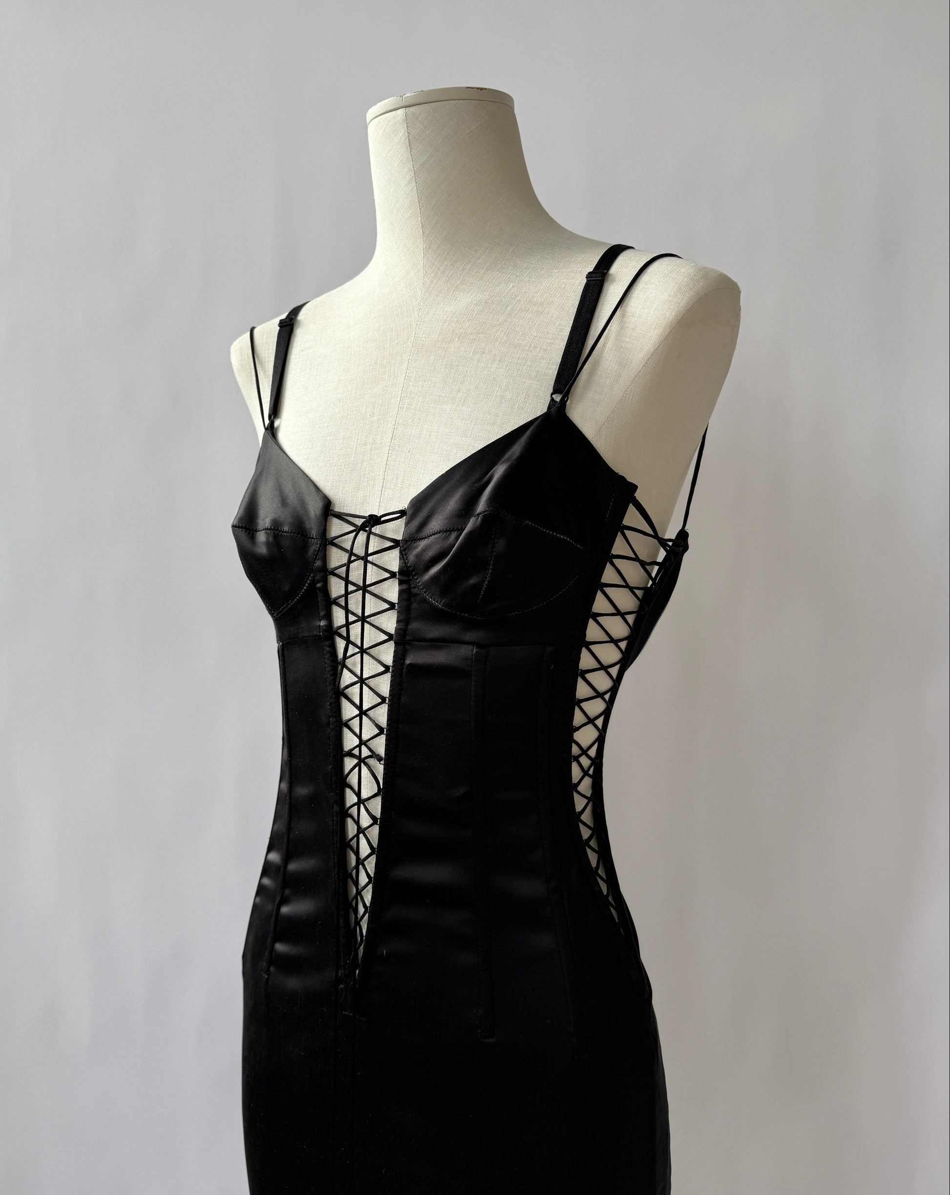 Detailed photo of the Dolce & Gabbana 2003 Bond Girl Dress viewed from the side on a mannequin