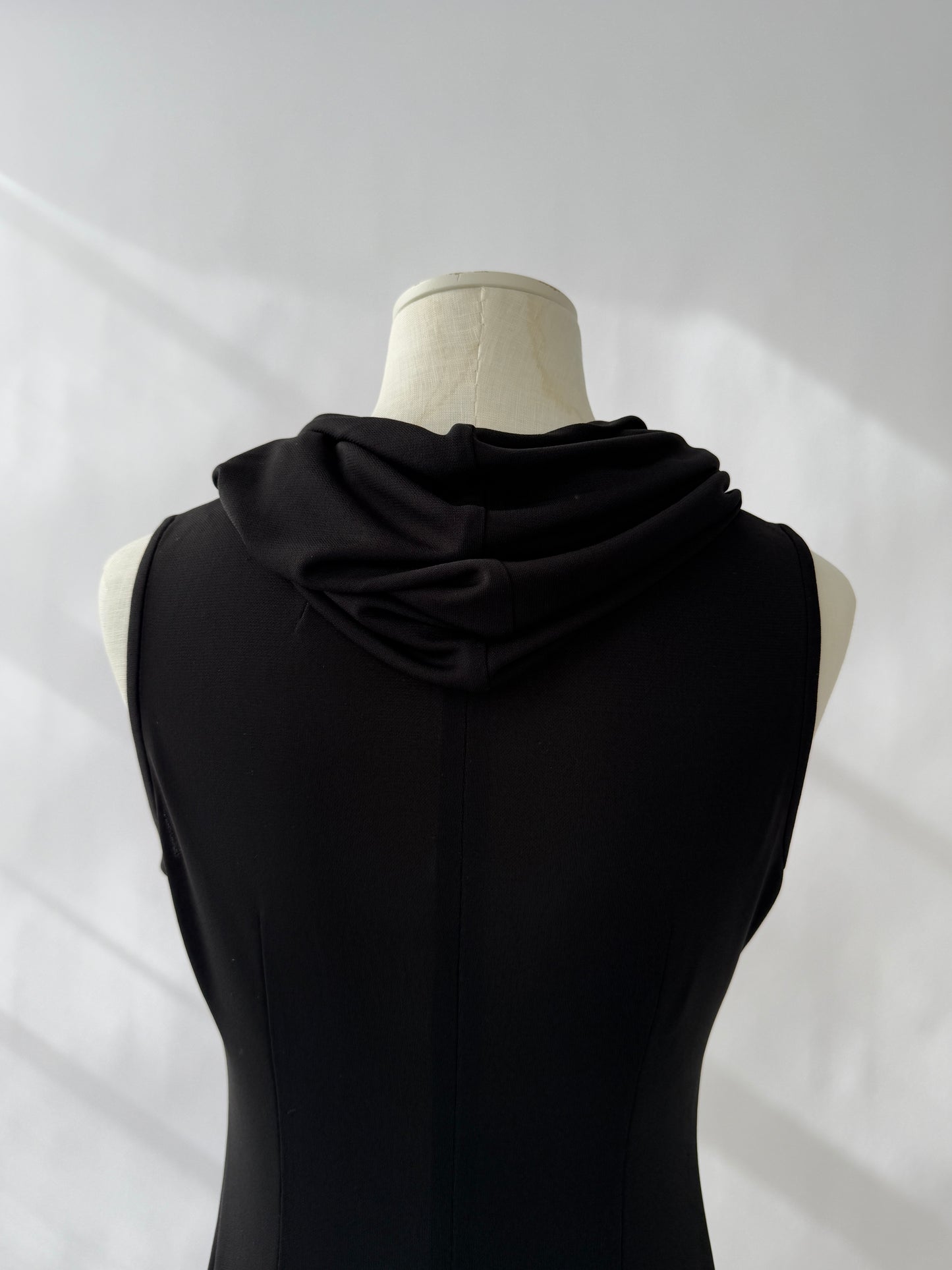 Close-up of the hooded detail on the Dolce & Gabbana 1996 Runway Hooded Mini Dress.