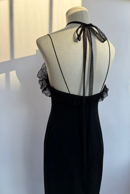 The Emanuel Ungaro 00's Black Silk Ruched Maxi Dress seen from the back, zoomed in on the back, on a mannequin.