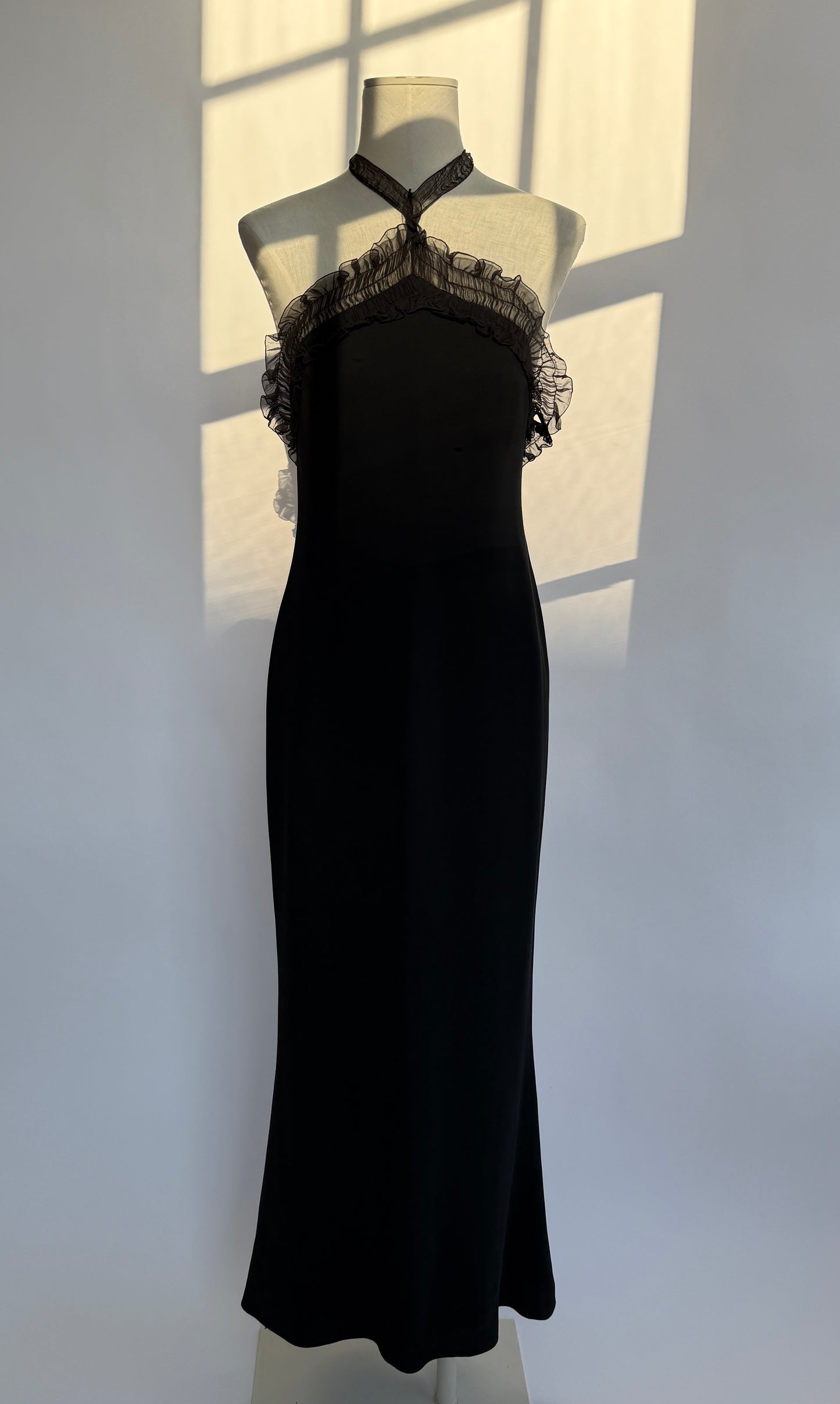 Full length front view of the Emanuel Ungaro 2000's Black Silk Maxi Dress on a mannequin.