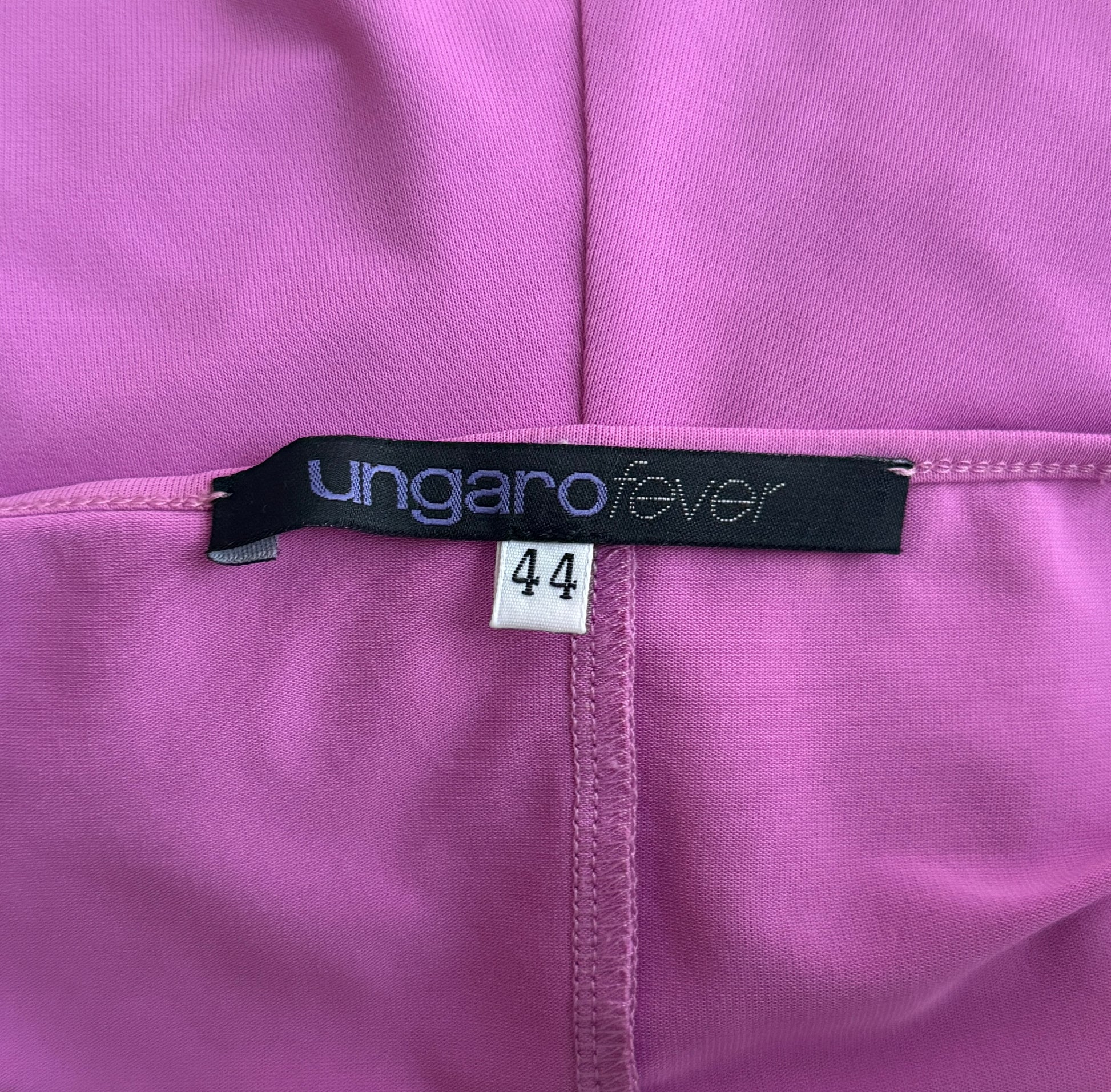 Detail photo of the brand and size tag of the Emanuel Ungaro silk ruffle top