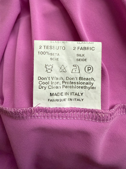 Detail photo of the care label of the Emanuel Ungaro silk ruffle top