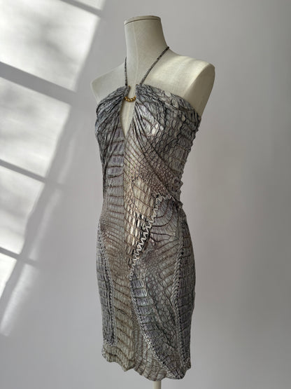 Roberto Cavalli S/S 2011 Crocodile Print Halter Neck Mini Dress with Gold Detail from the side in the sunshine on a mannequin.