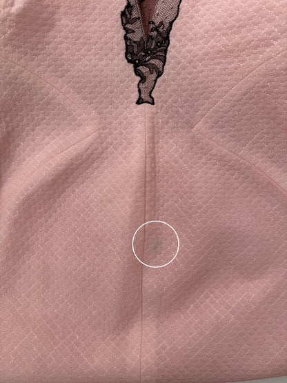 Close-up of the Versace dress showing the fabric.

