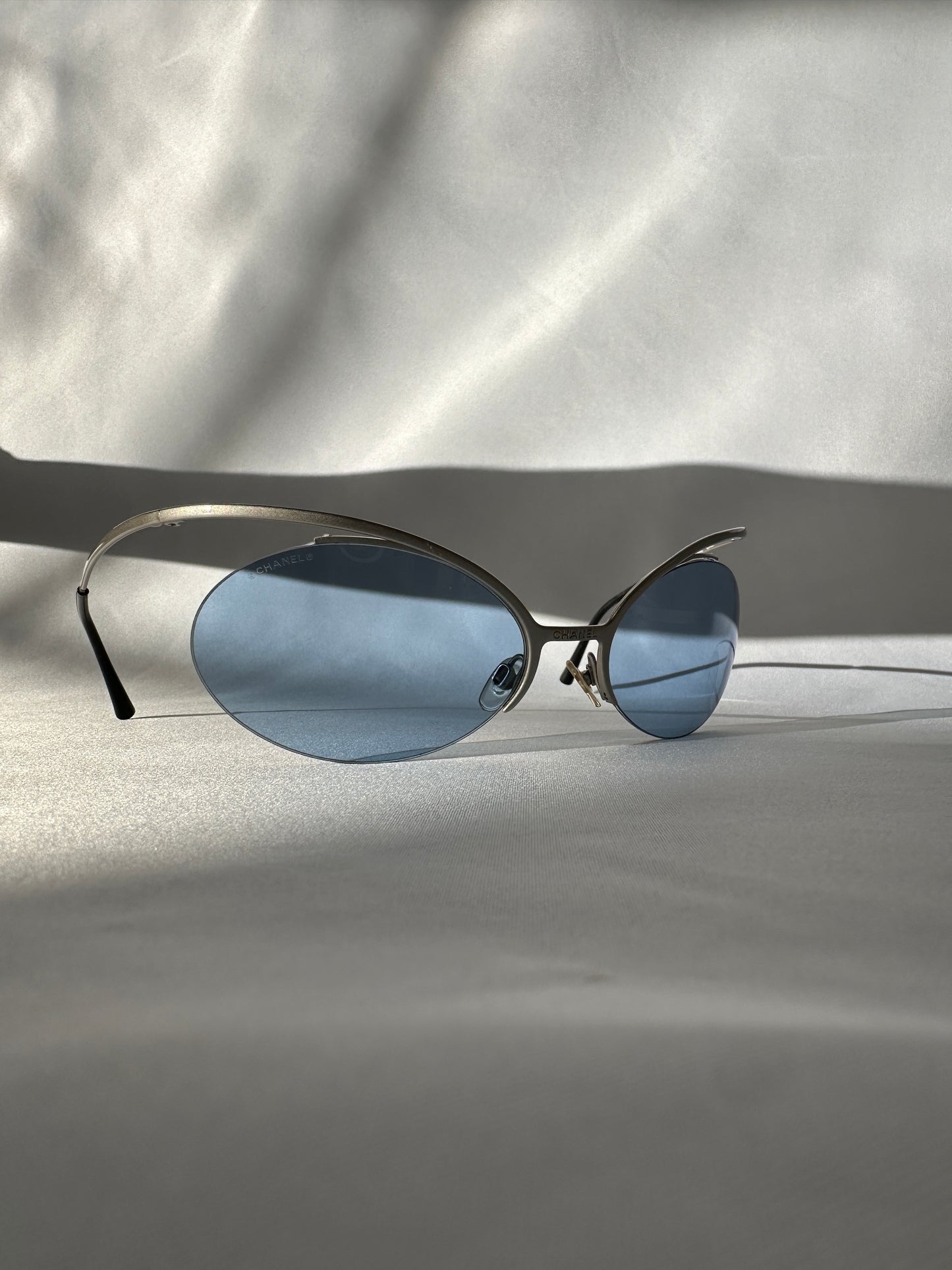 Chanel by Karl Lagerfeld S/S 2000 Futuristic Rimless Blue Sunglasses.