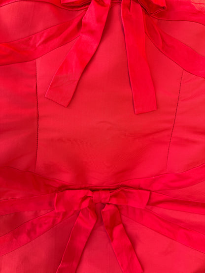 Fourth detail photo of the fabric of the vintage Valentino red dress
