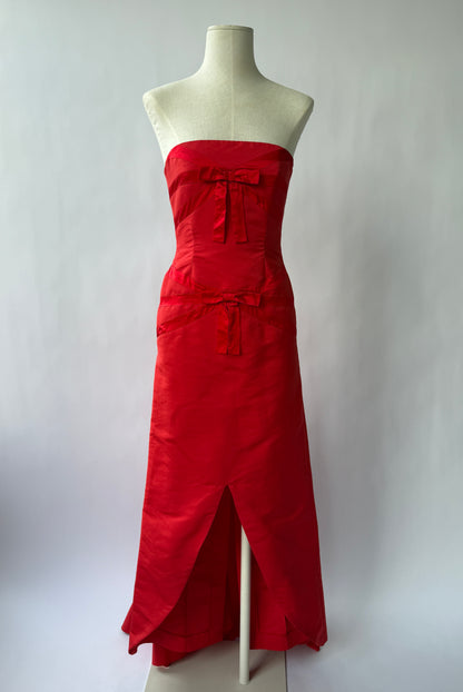 Full length front view photo of the Valentino vintage Strapless Red Bow Gown on a mannequin