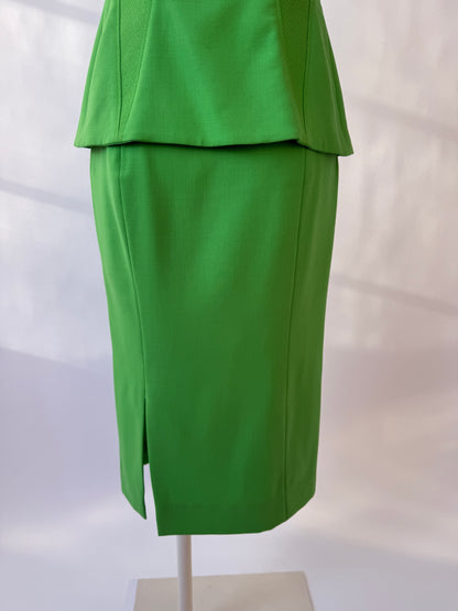 Close-up of the back of the Versace 1993 skirt on a mannequin agains a white background.
