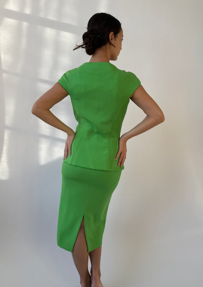 Back view of the Gianni Versace 1993 Vintage Runway Skirt Set on a model.