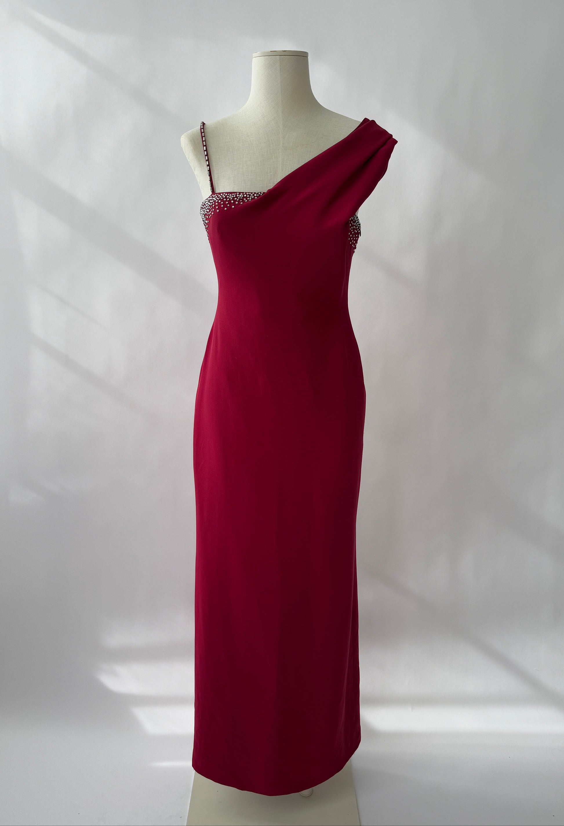 Full length front view of the Versace 1998 Red Rhinestone Embellished Gown viewed on a mannequin.
