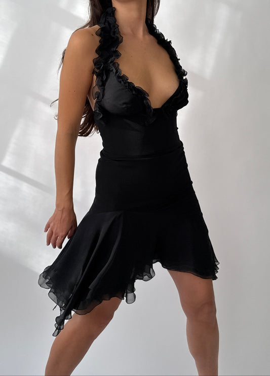 Front view of the Versace 2004 asymmetric silk ruffled dress showing plunging neckline and draped hem.